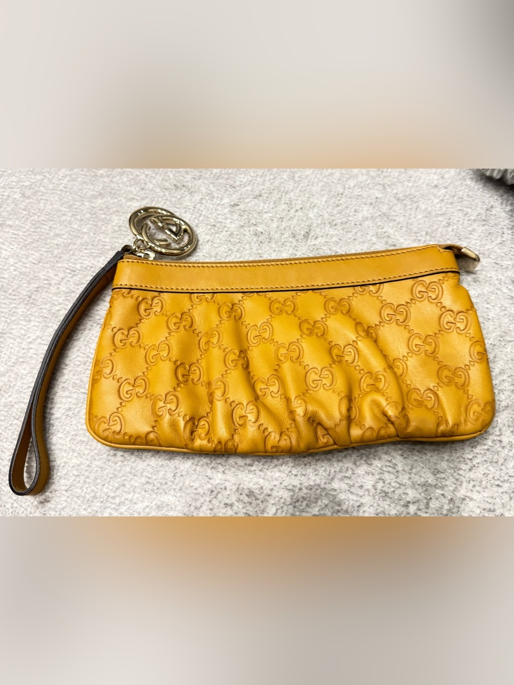 Gucci Mustard Yellow Embossed GG Leather Clutch with Gold Hardware